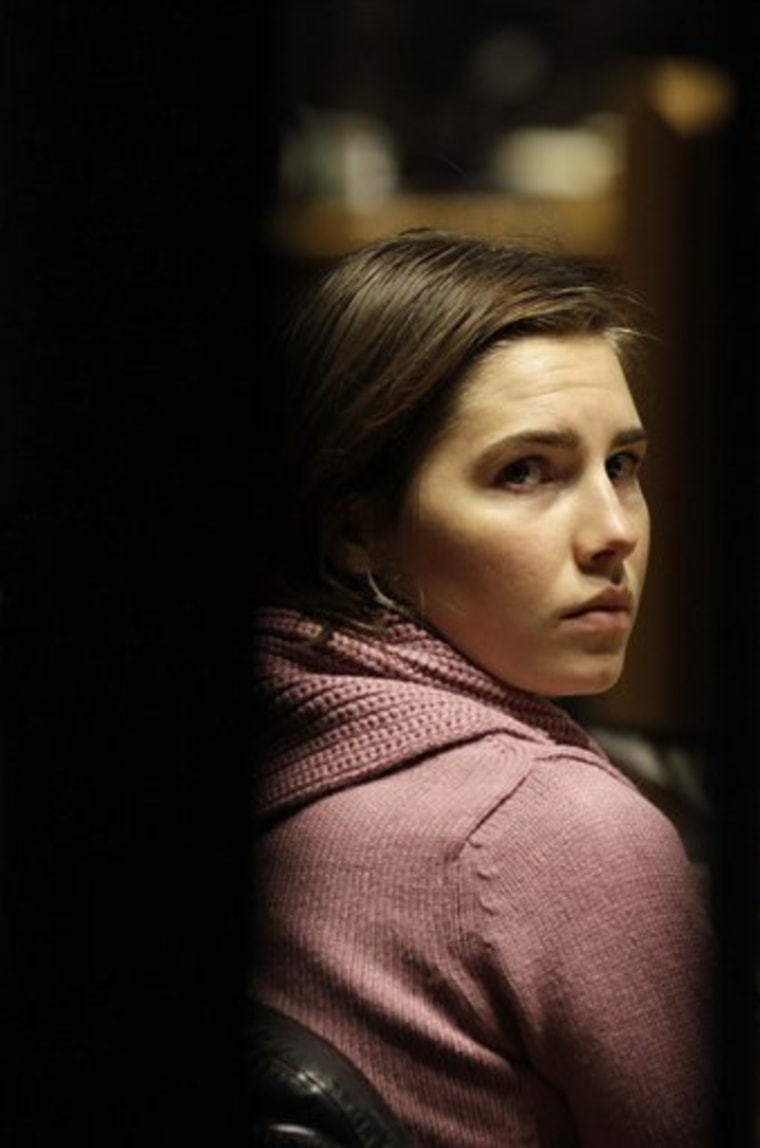 Convicted U.S. student Amanda Knox attends a hearing in her appeals trial, at Perugia's courthouse, Italy, Saturday, Dec. 18, 2010. Knox was convicted and sentenced last year to 26 years in prison for the murder of her British roommate Meredith Kercher. (AP Photo/Alessandra Tarantino)